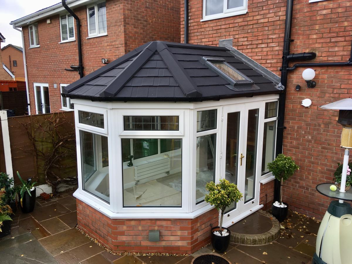 Victorian roof conversion in ebony metrotile shingle for a Cleveleys conservatory.