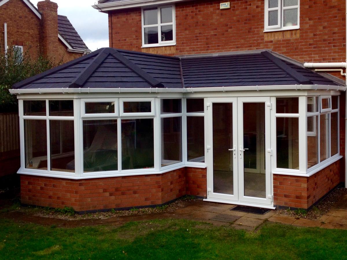 Ebony shingle style roofing for a p-shaped conservatory in Blackpool.