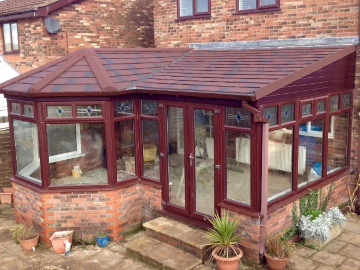 Umber shingle styled solid conservatory roof conversion for a property in Singleton, Poulton-le-Fylde.