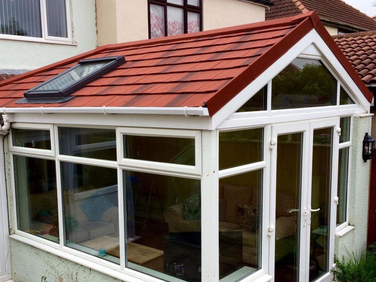 Antique red tiled gable roof with Velux window for a client's conservatory in Knott End, Over Wyre.